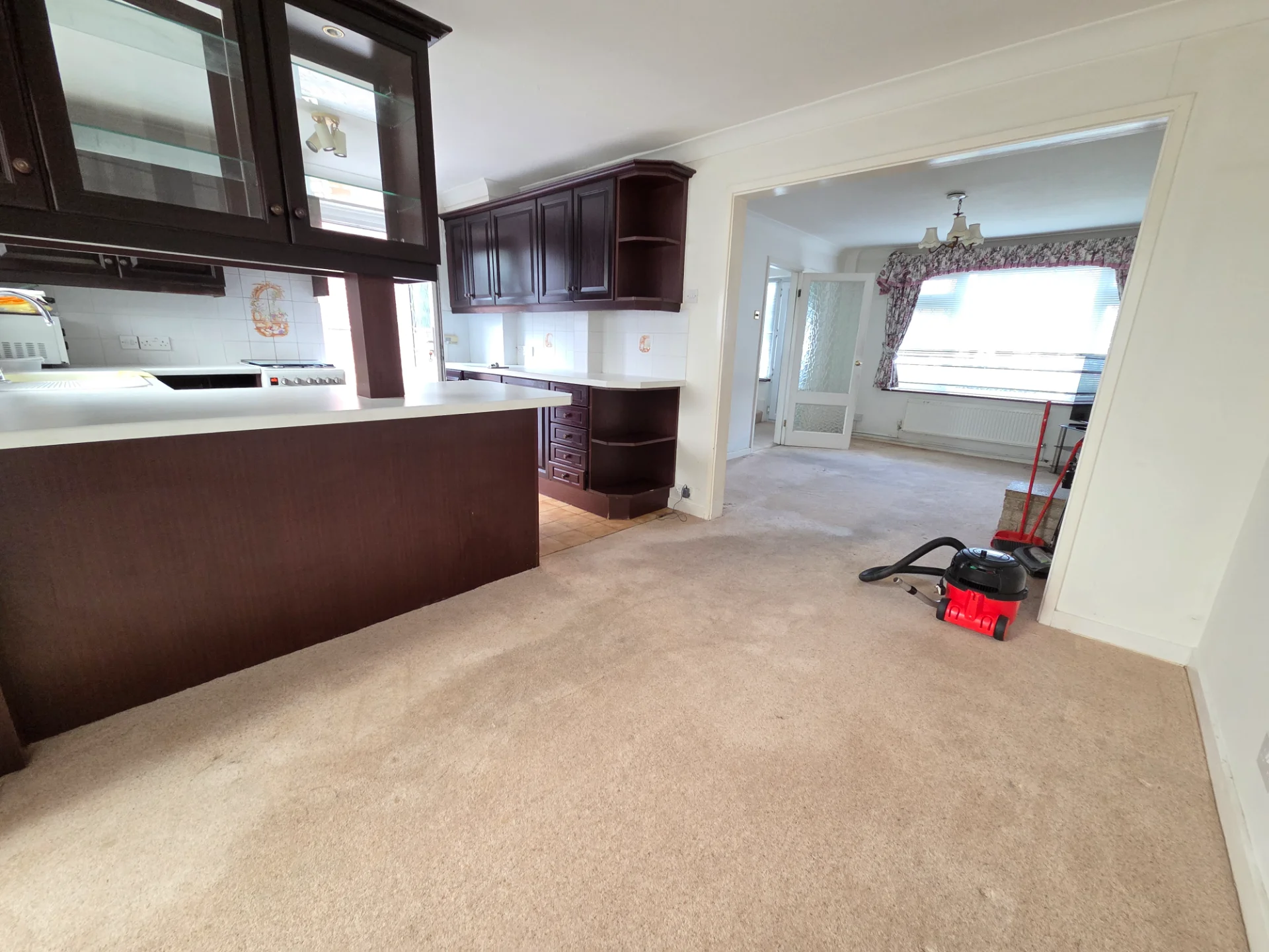 Domestic clean for a biweekly client showing freshly mopped kitchen and tiled floors